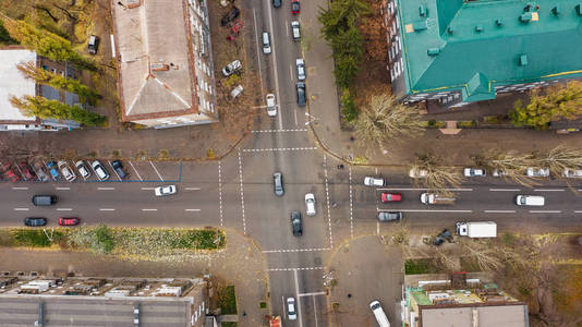 s eye top view of crosswalk in Dnipro city in Ukraine. Looking d