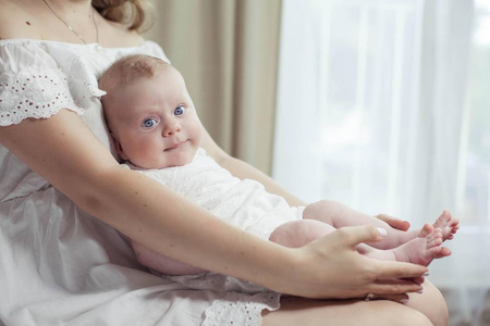 s feet in the mother hands. Cozy. Love.