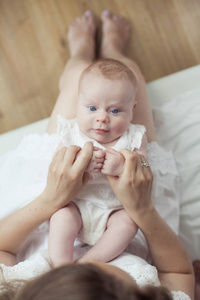 s feet in the mother hands. Cozy. Love.