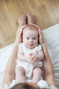 s feet in the mother hands. Cozy. Love.