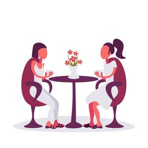 餐桌卡通两个女孩坐在咖啡馆餐桌沟通概念隔离女性卡通人物平照片