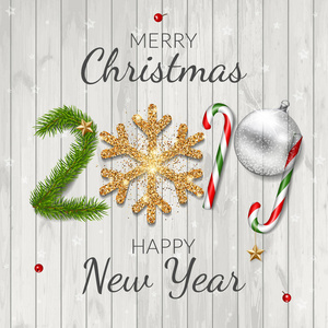 圣诞快乐，新年快乐，2019年贺卡在木材背景。