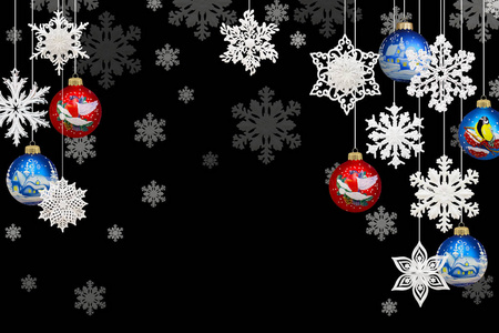 圣诞节和新年装饰品黑色背景上的雪花和圣诞球。