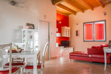  living room, with red sofa.