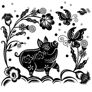 猪的剪纸艺术和工艺风格在猪的背景下，猪的农历新年。