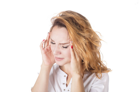 头痛的美女抱着头,被隔离在白色背景下照片