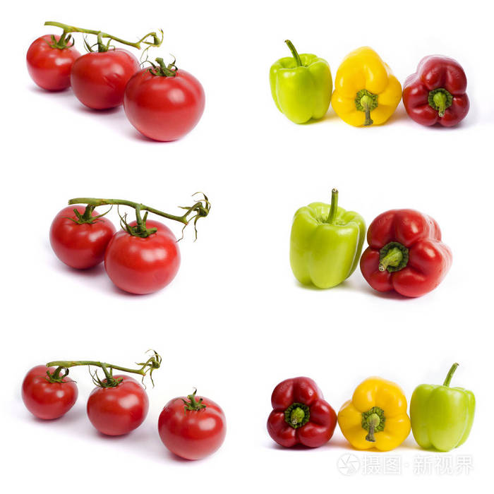 白色背景上的西红柿和甜椒。 白色背景上的红色和黄色辣椒。 西红柿中有五颜六色的辣椒。