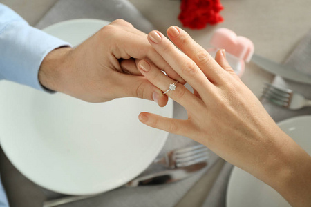 s finger at romantic date