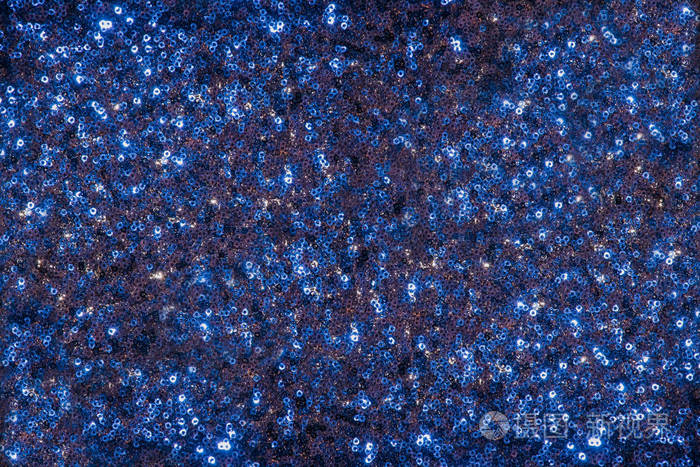 喜庆闪亮的蓝色面料背景的亮片. 闪亮的蓝色织物