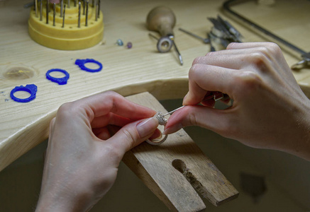 s workshop , handwork. Craft jewelery making.