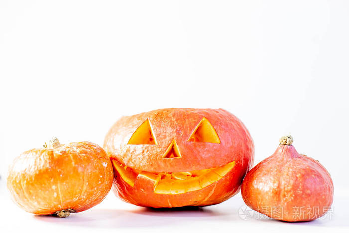 万圣节假期的概念.由橙色南瓜制成的组合物