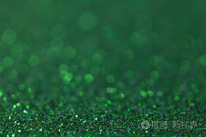 深绿色闪闪发光的背景从小亮片特写灿烂的钻石背景