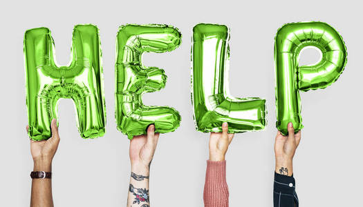 volenteering紫色字母气球形成的单词帮助照片