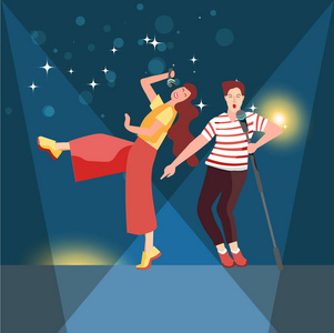 用麦克风唱歌跳舞年轻人在音乐会上为观众或在卡拉ok俱乐部唱歌.