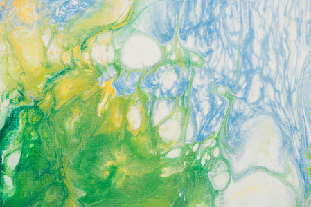 蓝色白色和绿色帆布上液体丙烯酸的美丽抽象背景