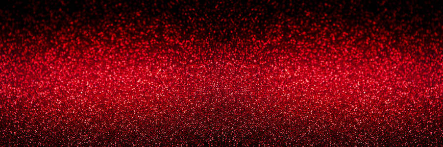 红色抽象模糊的闪光背景节日。 闪光的纹理。 圣诞新年