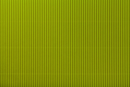 橄榄纸板背景特写的条纹图案.照片