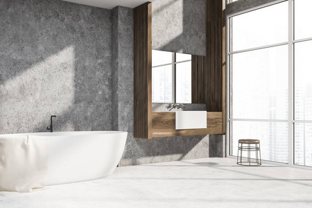 现代浴室的角落，混凝土墙，白色地板，阁楼，窗户，白色浴缸和水槽站在木制台面上。 3D渲染