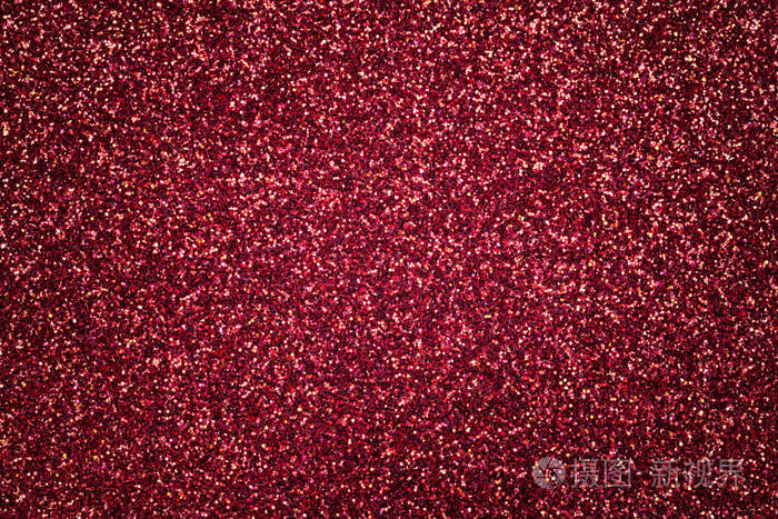 暗红色闪闪发光的背景从小亮片特写. 来自纺织品的明亮闪亮的背景.