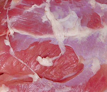 肉纹理的背景。 一块新鲜猪肉背景。