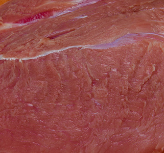 肉纹理的背景。 一块新鲜猪肉背景。