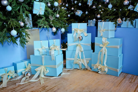 s Day , blue gifts . Collection of little handmade gift boxes in