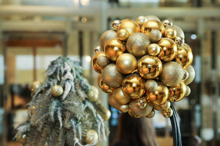 s round golden balls. Christmas balls close up picture. Three go