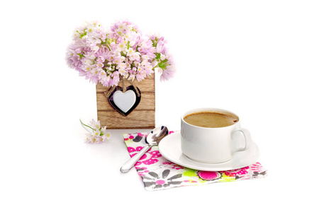 s Day or birthday. Romantic bouquet with flowers and a cup of co