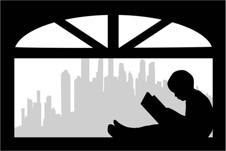 有书的人的剪影.照片