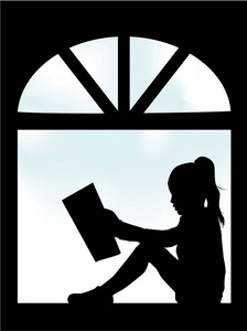 有书的人的剪影.照片