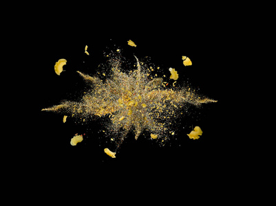 概念爆炸黄色生意大利面食从中心与不集中的元素在黑暗的背景。
