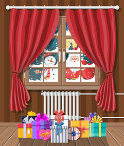 圣诞老人和雪人看在客厅的窗户里