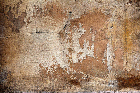 美丽的老墙，有很大的裂缝和纹理。 可用作背景