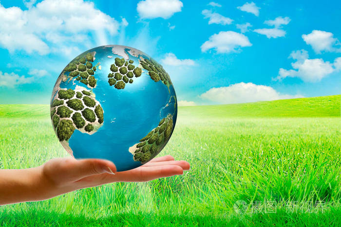 生态理念手抓植物树苗地上世界环境日