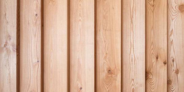 云杉亮木背景光天然木条正面宽云杉木房子纹理照片