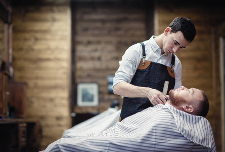 s work. Barber shaves the client39