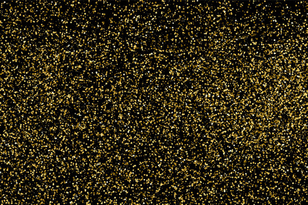 金色的闪光纹理隔离在黑色上琥珀颗粒的颜色庆祝背景纸屑的金色爆炸