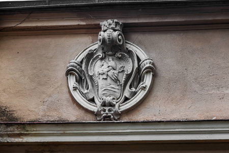 s face, women in basrelief of an old building