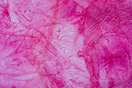 粉色折痕纸组织纹理背景