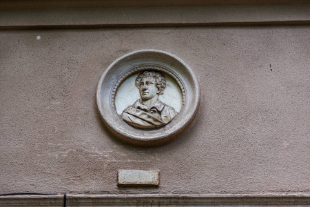 s face, women in basrelief of an old building