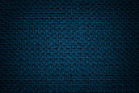 海军蓝背景从纺织材料与柳条图案特写. 具有纹理的牛仔布结构.