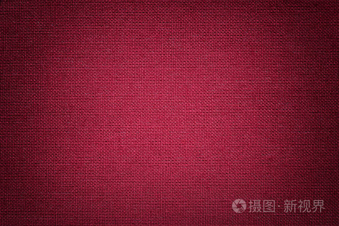 深红色背景从纺织材料与柳条图案特写. 具有质地的葡萄酒织物的结构.