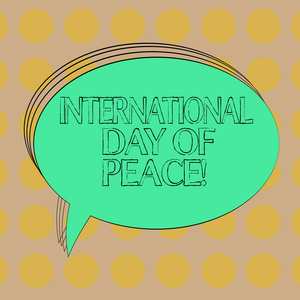 写文字国际和平日。概念意味着世界和平庆祝希望自由空白椭圆形概述固体颜色讲话泡沫空文本气球照片