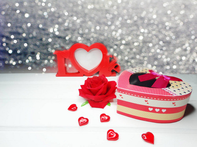 s day gift box with hearts rose on shiny background 