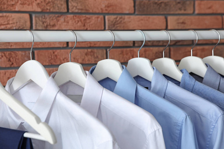 s clothes near brick wall, closeup