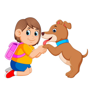 一个小女孩,带着粉红色的袋子,抱着狗的翅膀照片