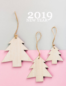 s Day festive decoration, wooden Christmas tree on pink and gray