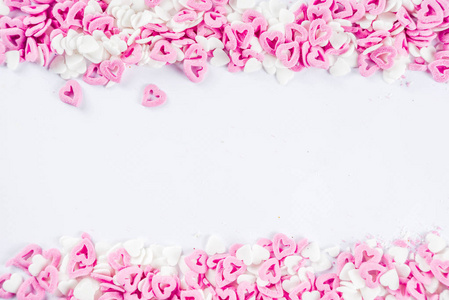 s sweets background, white background with sugar hearts sweet sp