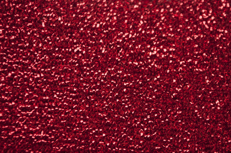 红色闪光的背景与闪烁的细节.照片