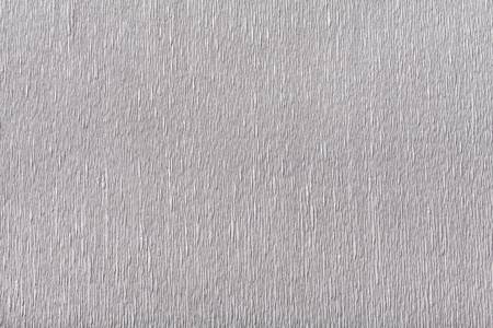 皱褶绉结构浅灰色纸板宏观.照片
